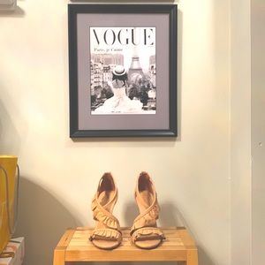 BCBG MaxAzria leather stilettos with ruffle detail and back zipper.